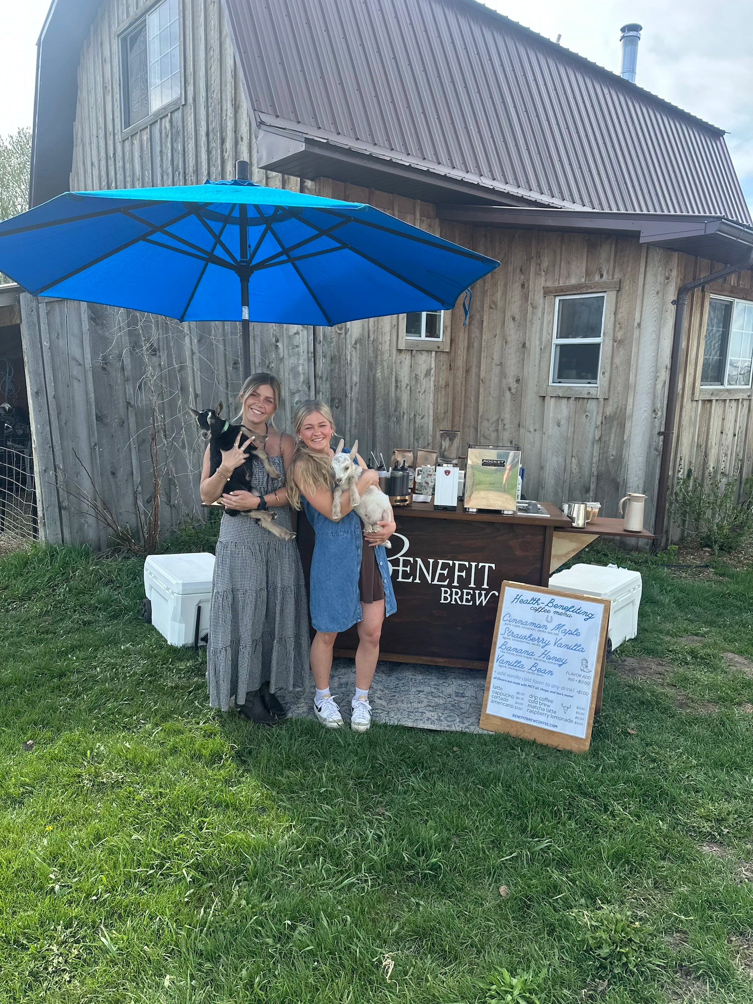 Baristas serving coffee at a local farm from Benefit Brew coffee stand. 